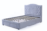 Modern design of the head of a velvet fabric upholstered four drawer storage bed